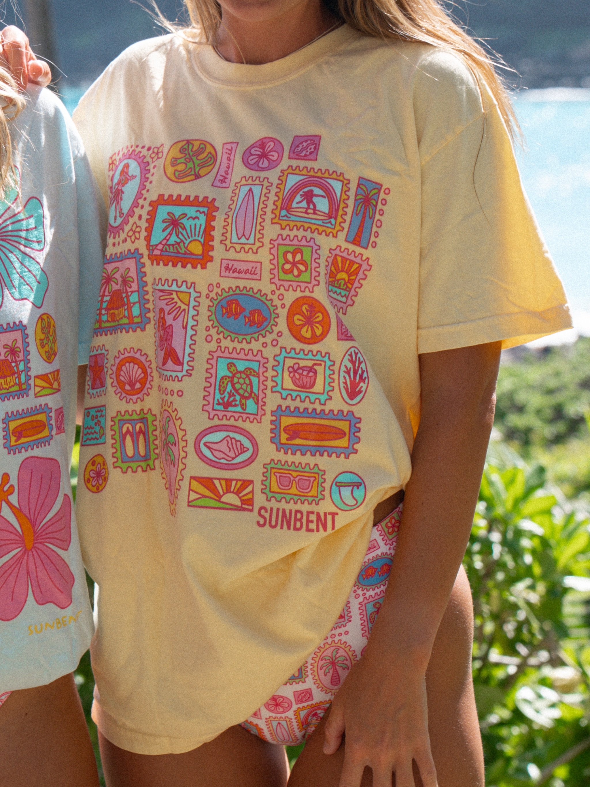 Postcards from Paradise Tee's – Sunbent